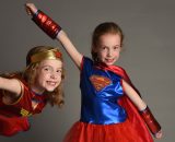 Two young girls, Ciara and Aoife, dressed as superheros