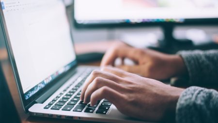 Person typing on laptop. Photo by Glenn Carstens-Peters on Unsplash