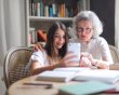 Grandmother takes selfie with her granddaughter